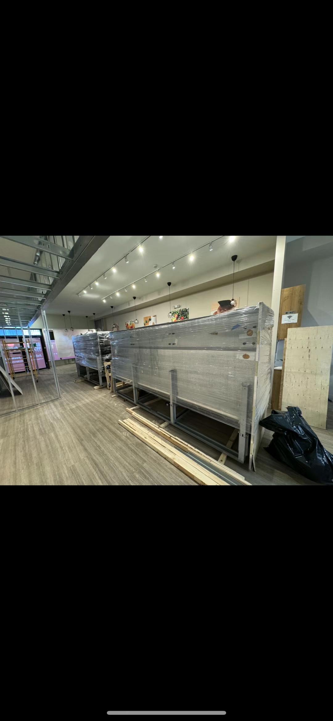 Display cooler equipment staged inside Big Way Kerrisdale